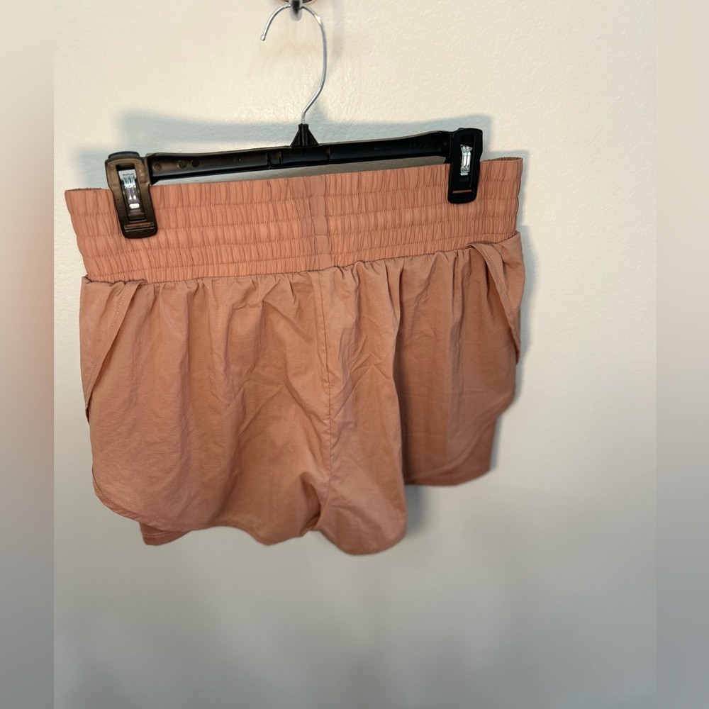 all in motion, medium, tanish orange